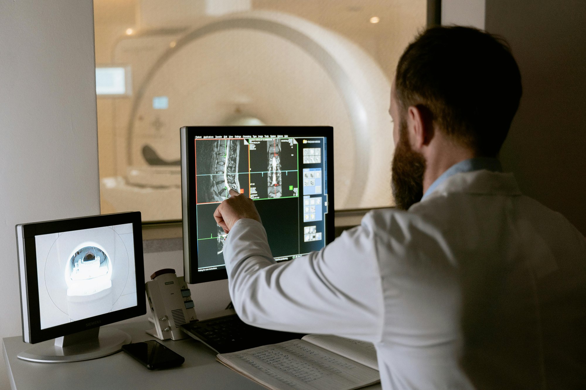 radiologist reviewing medical images radiologist reviewing medical images